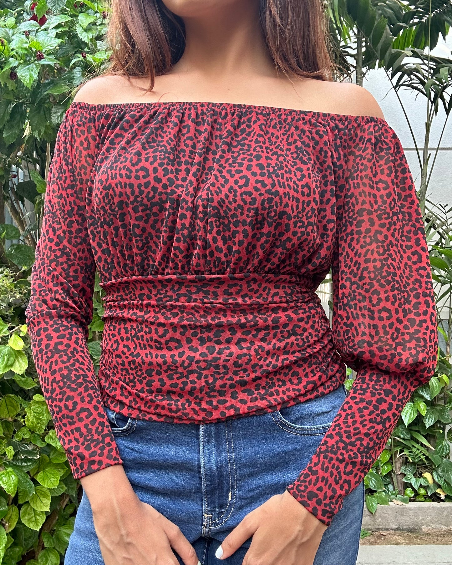 Red and black animal print fitted top