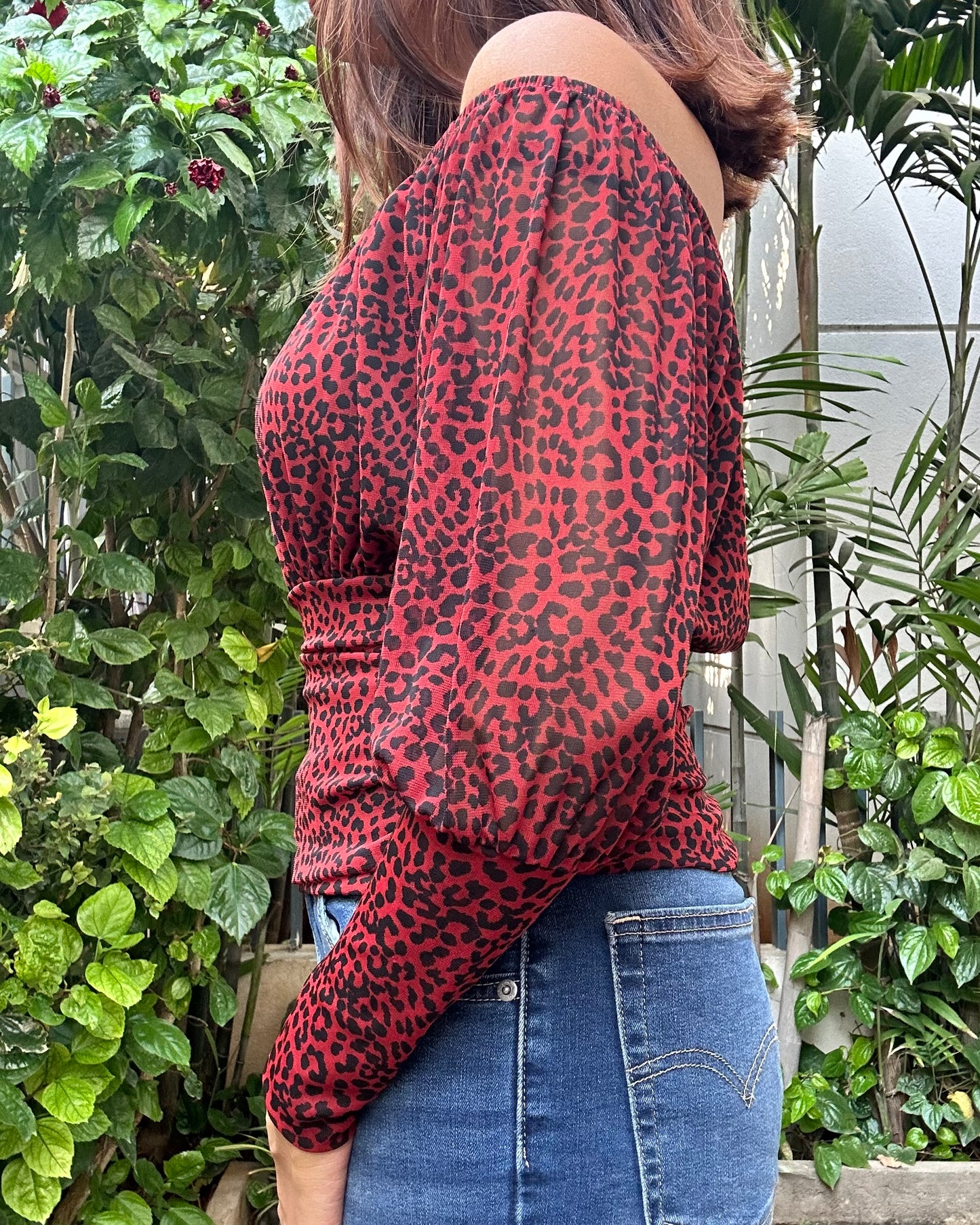 Red and black animal print fitted top