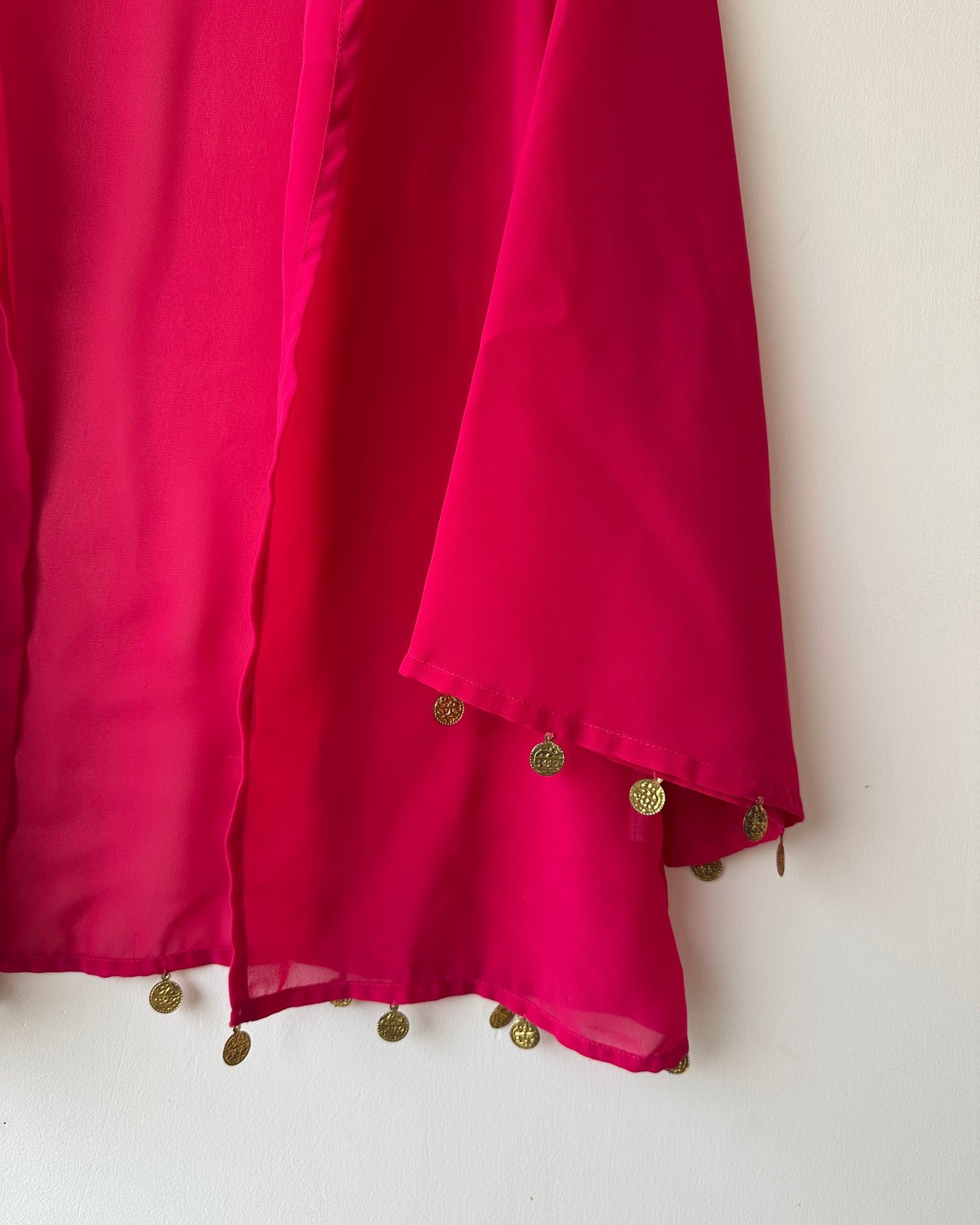 Pink oversized shrug with coin accessories