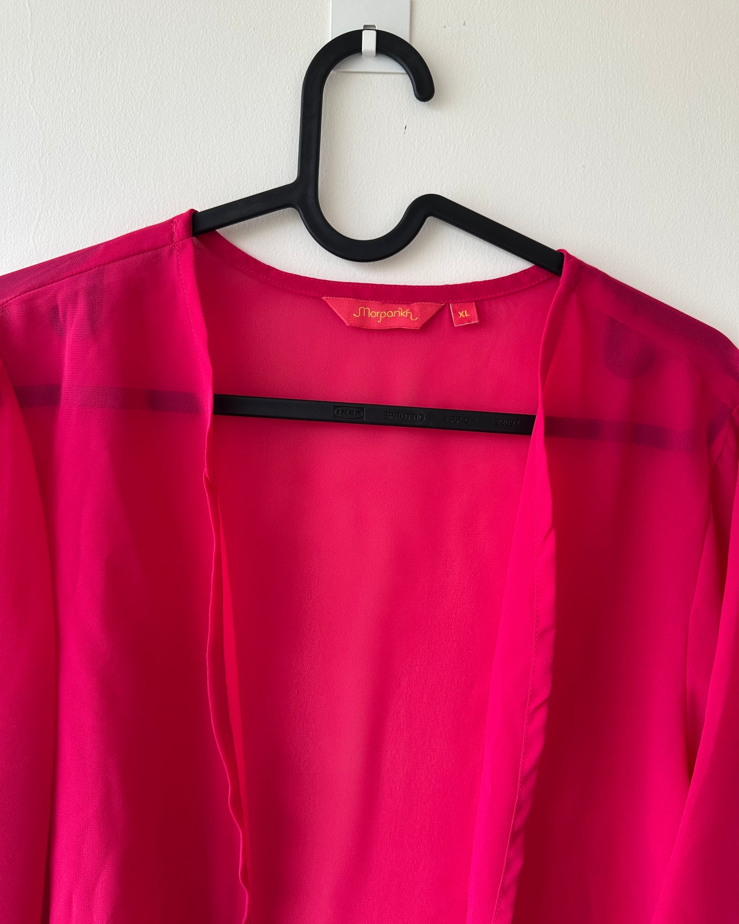 Pink oversized shrug with coin accessories