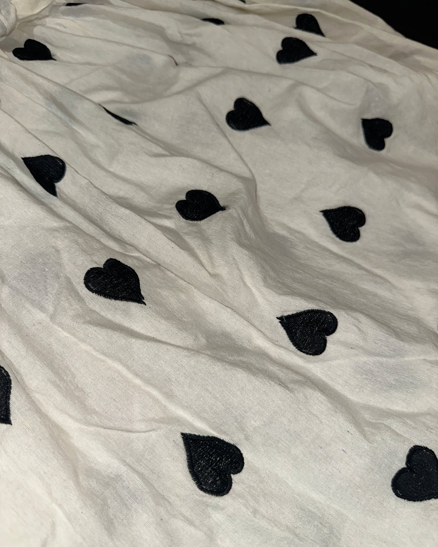 Black and white cotton top with heart embroidery