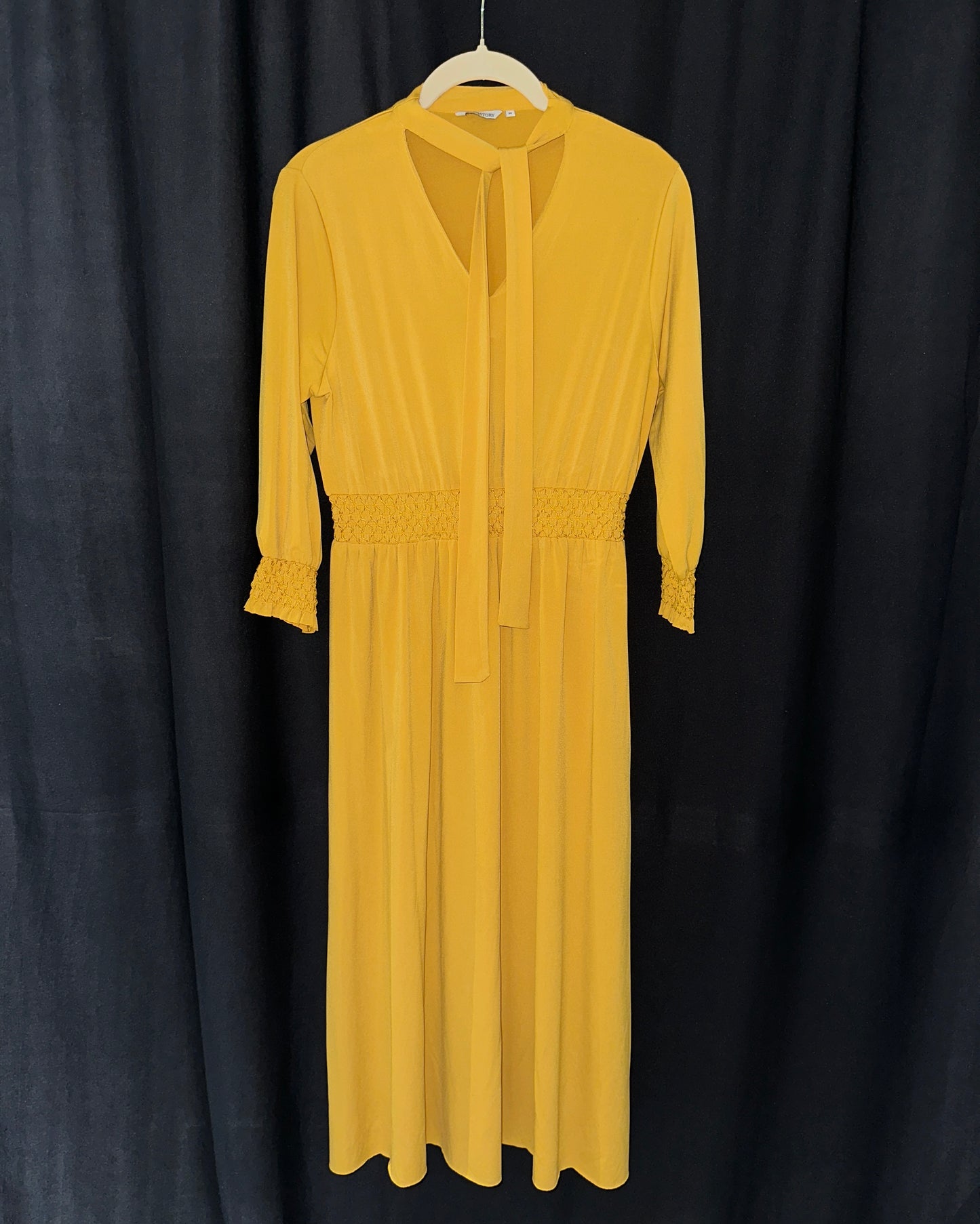 Yellow midi dress with shirring
