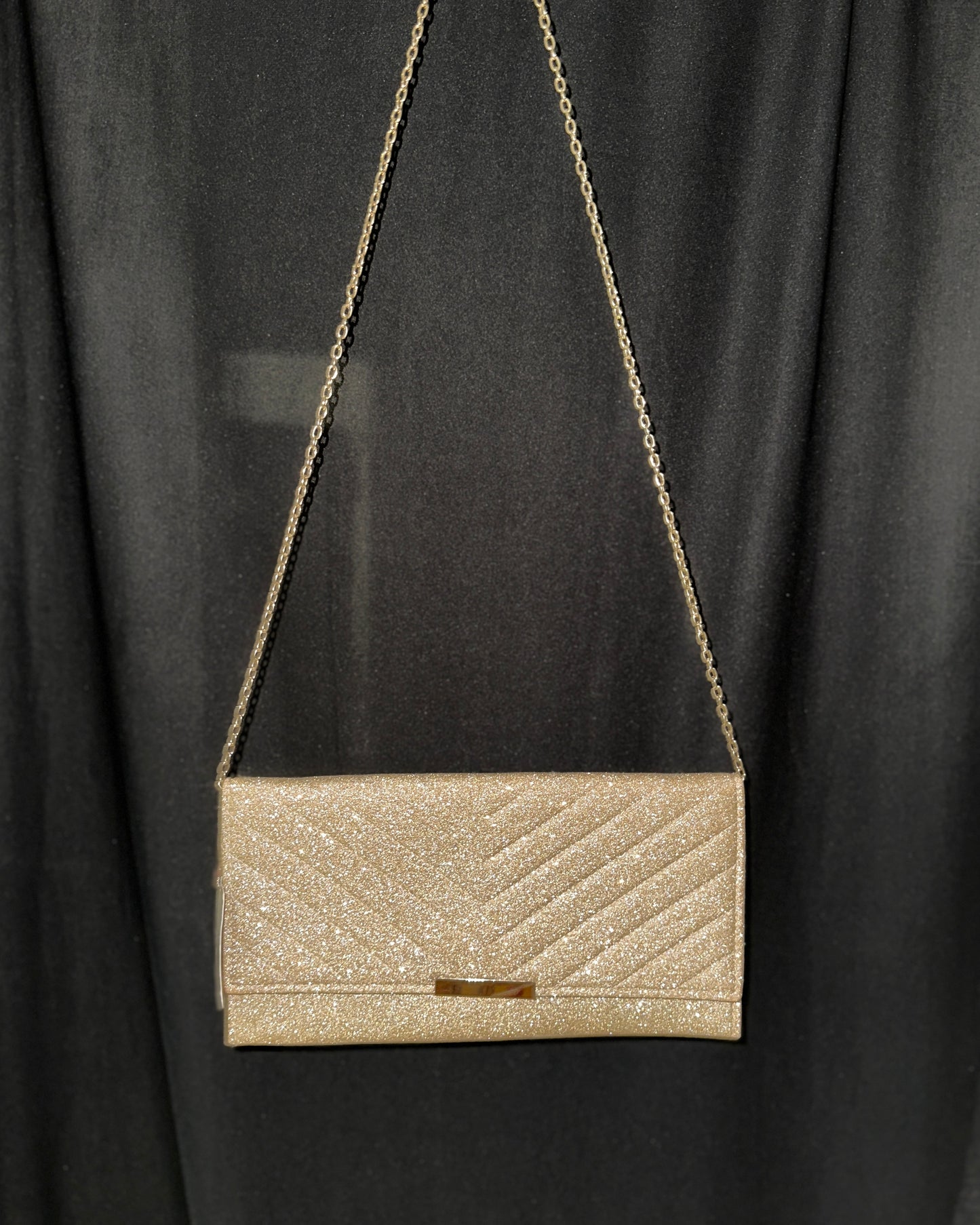 Gold-toned embellished clutch