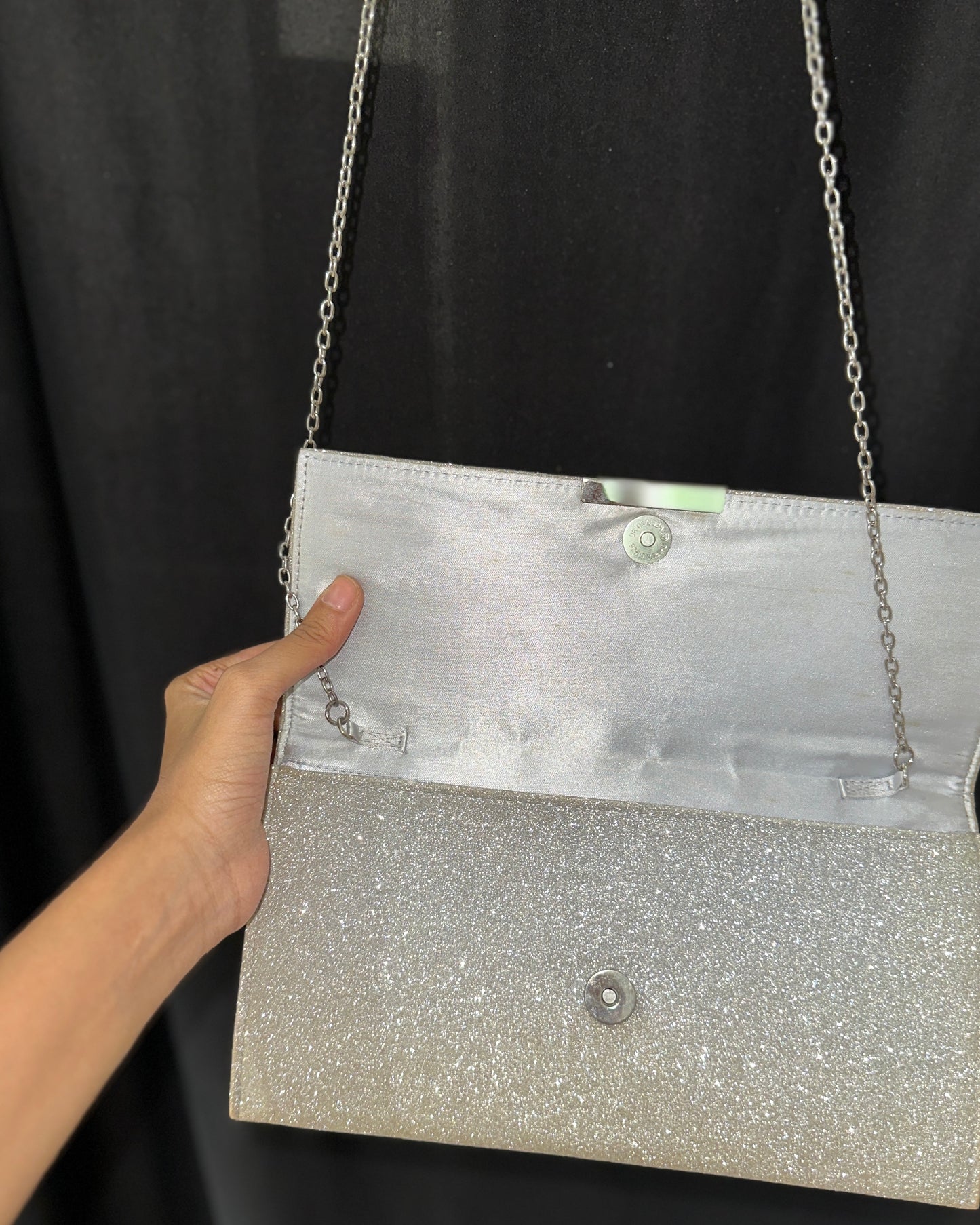 Silver-toned embellished clutch
