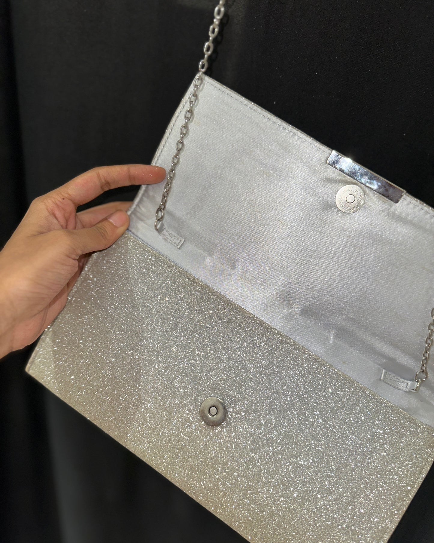 Silver-toned embellished clutch