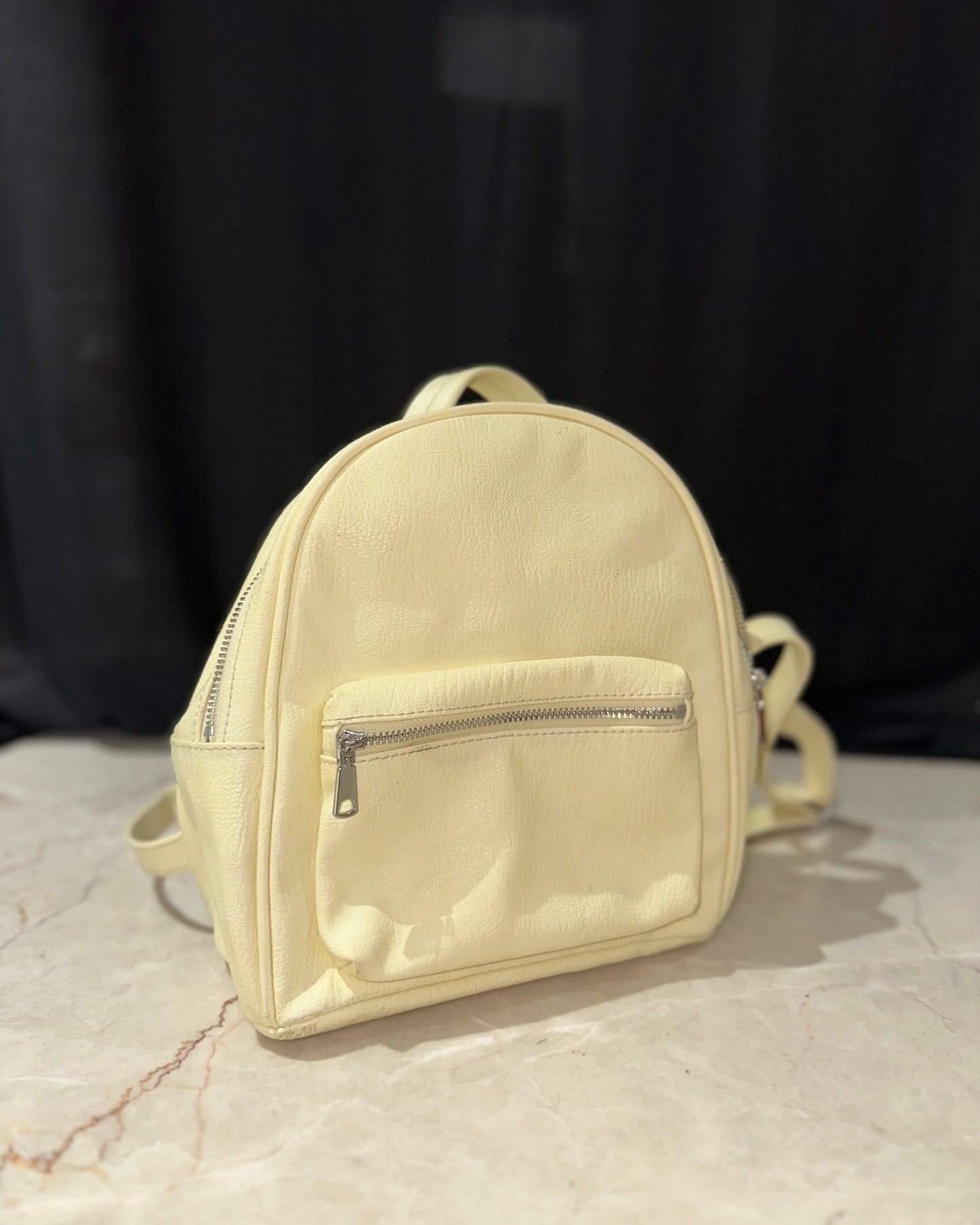 Light yellow small backpack