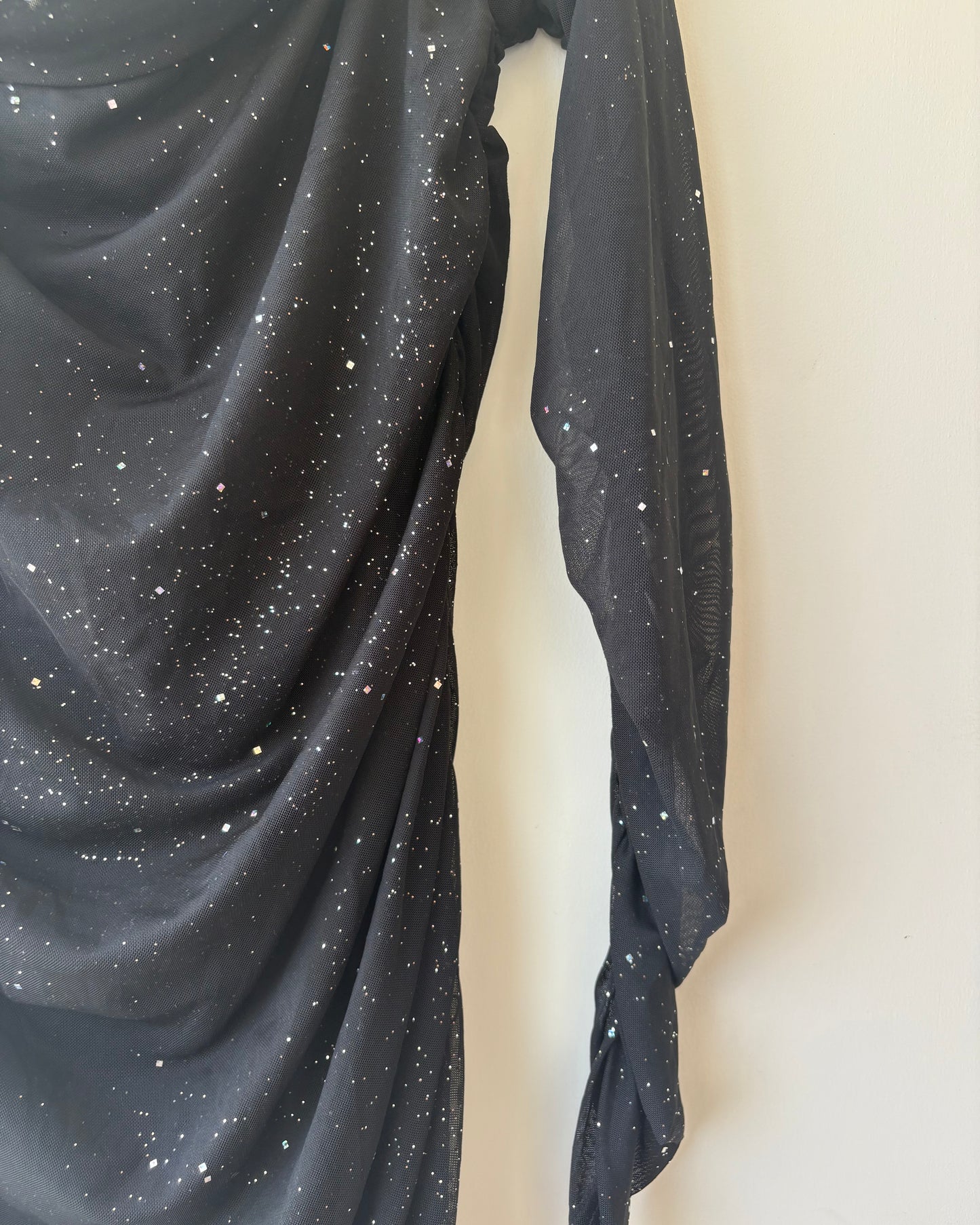 Black offsholder ruched dress with shimmer