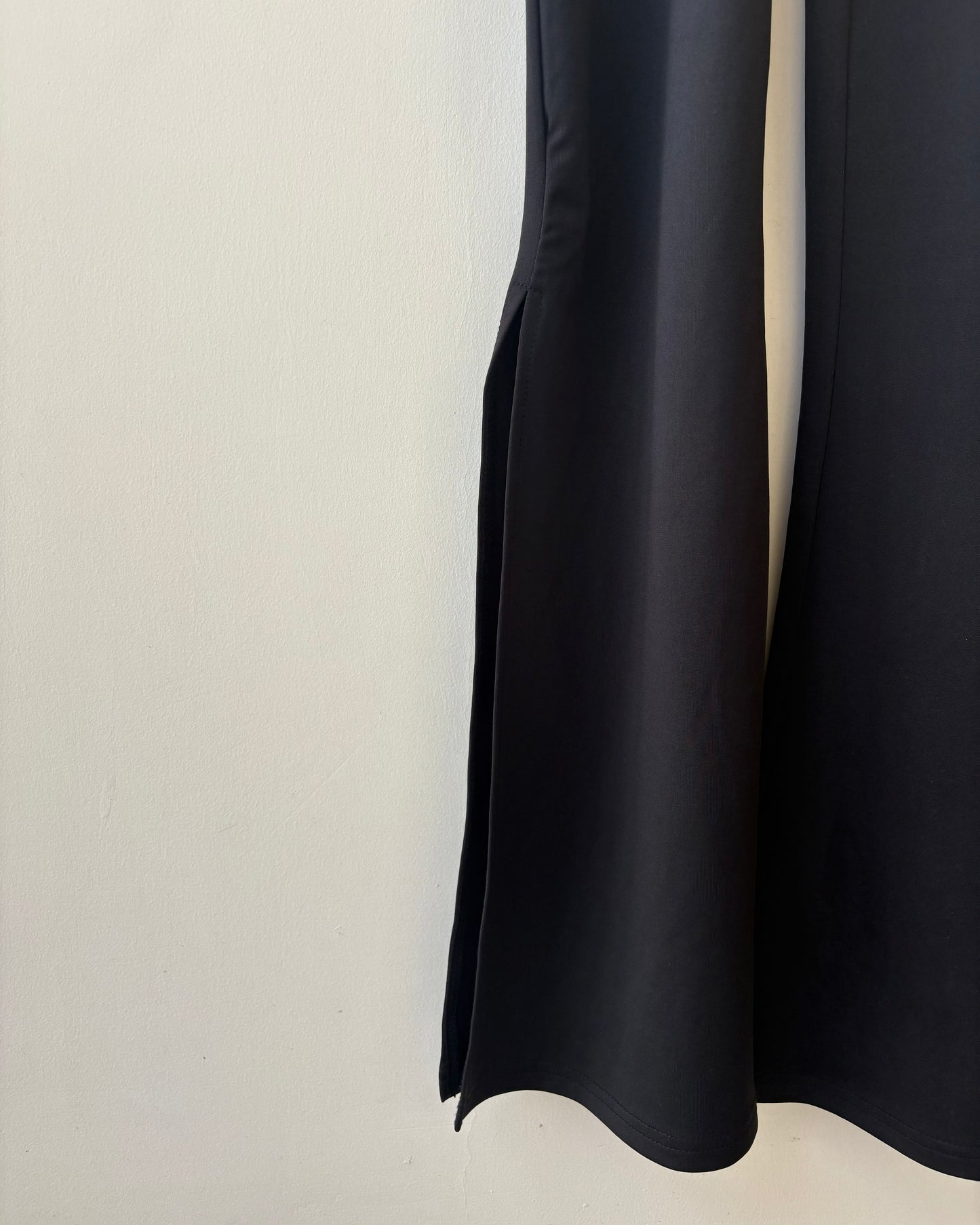 Black jumpsuit with lace bodice and back tie-up