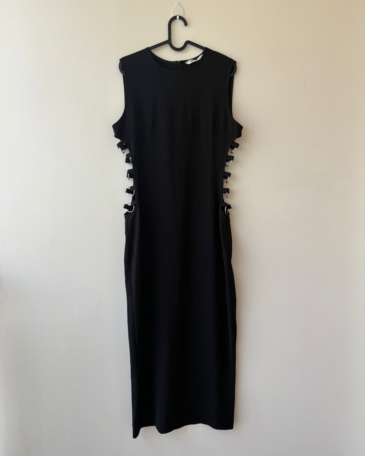Black maxi dress with metal ringlets