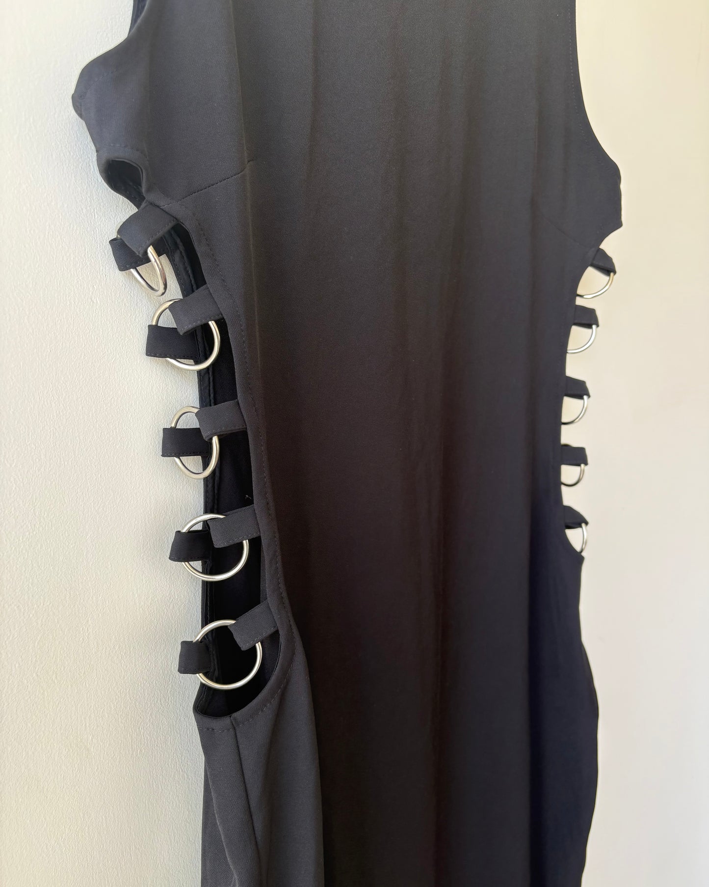 Black maxi dress with metal ringlets