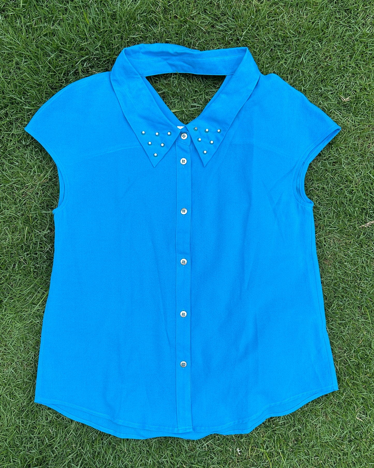Blue collared top with metal studs