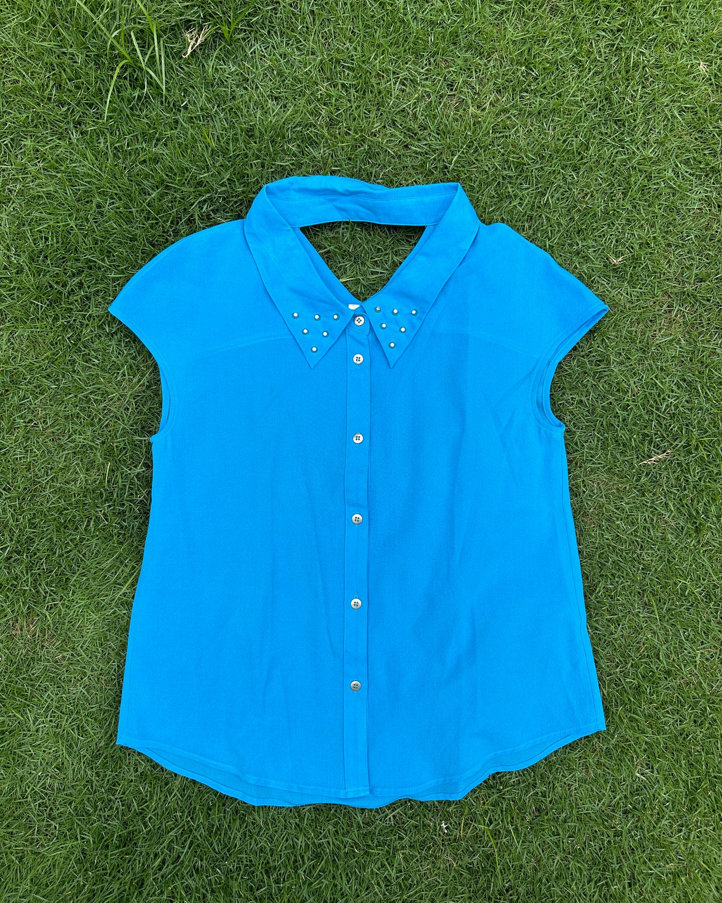 Blue collared top with metal studs