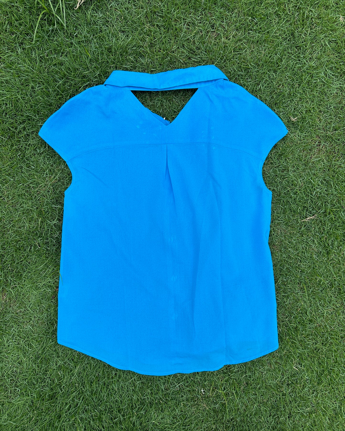 Blue collared top with metal studs