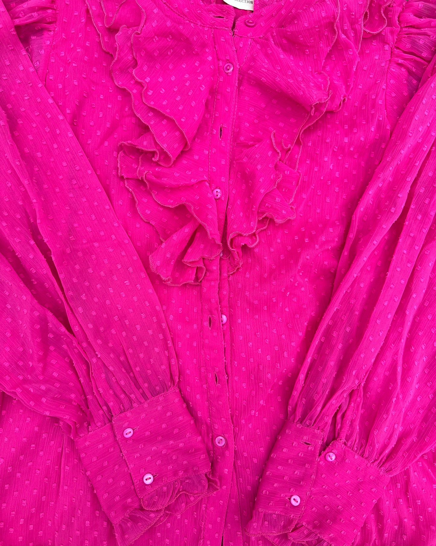 Pink flounced blouse with frilled collar