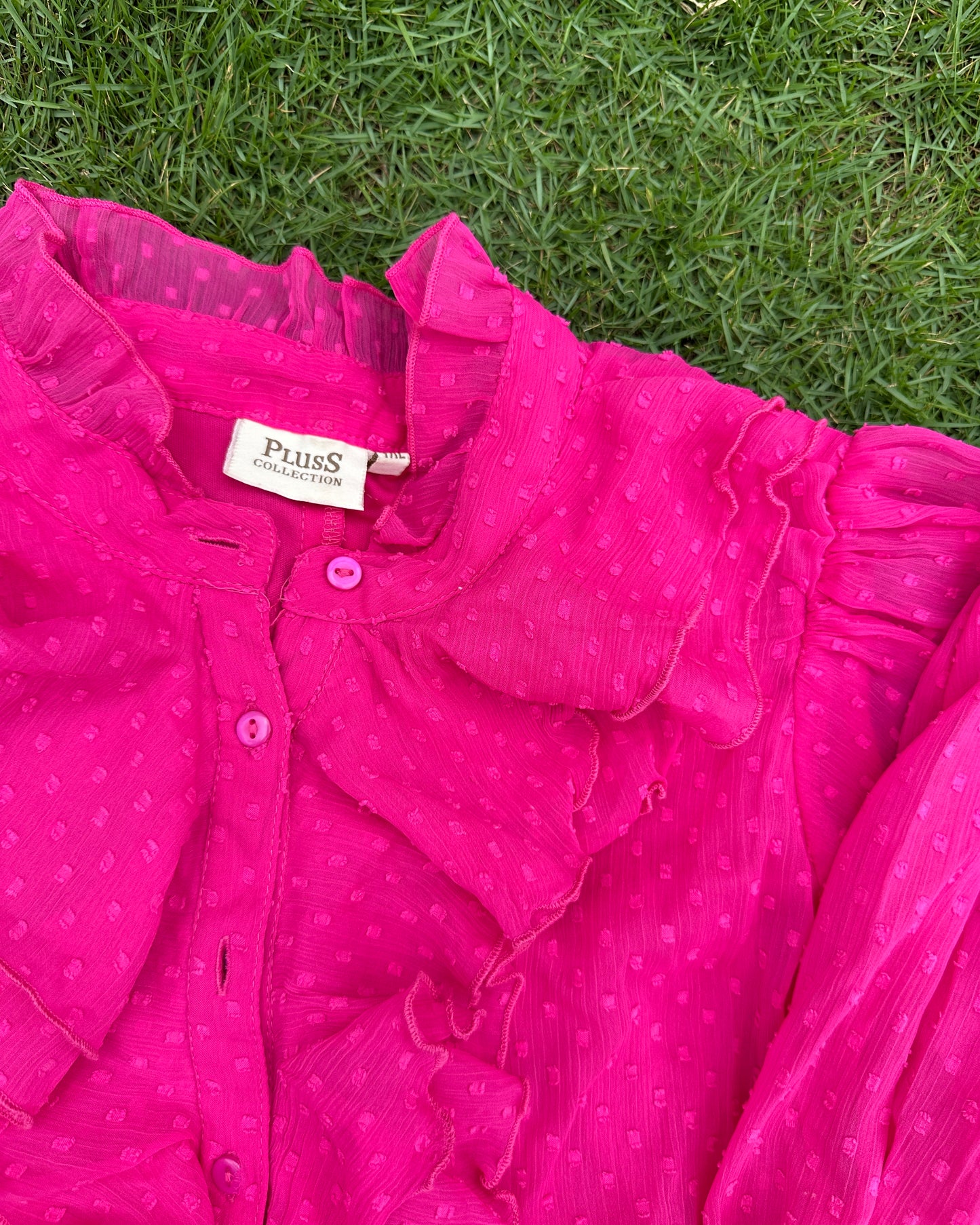 Pink flounced blouse with frilled collar