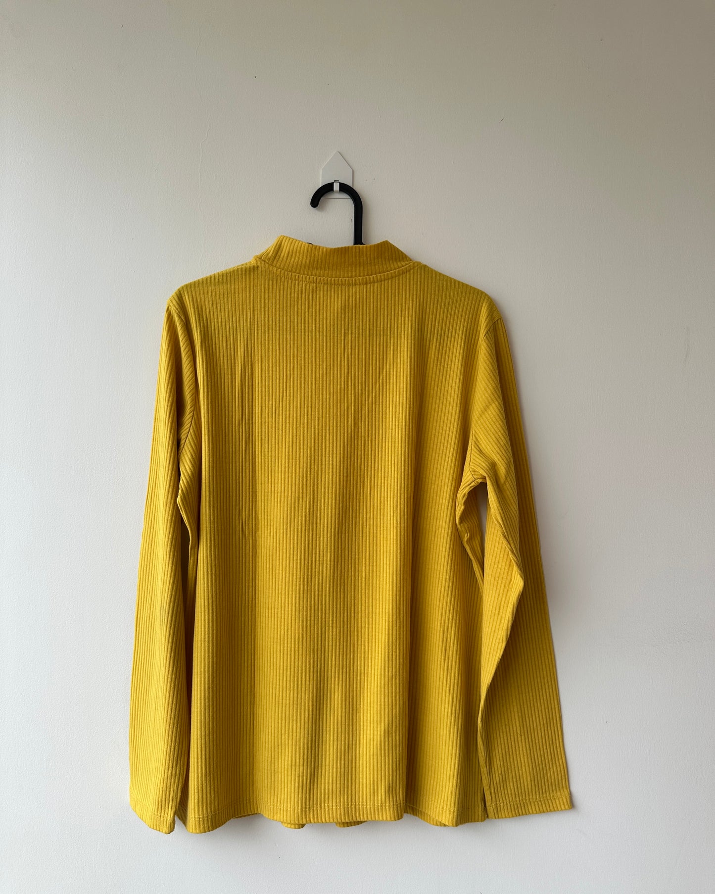 Yellow high neck top with long sleeves