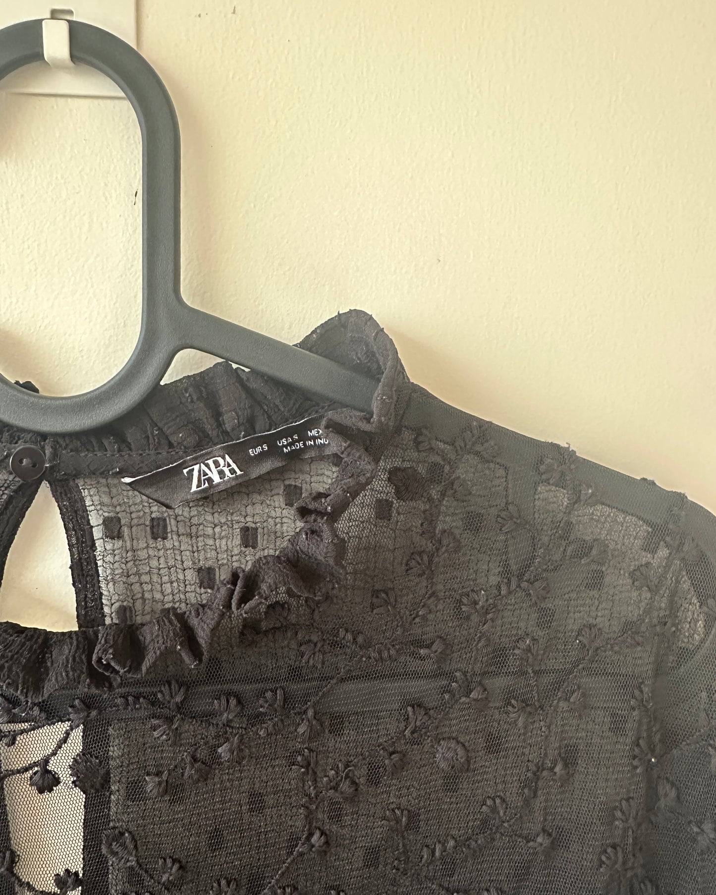 Black lace blouse with sheer neck