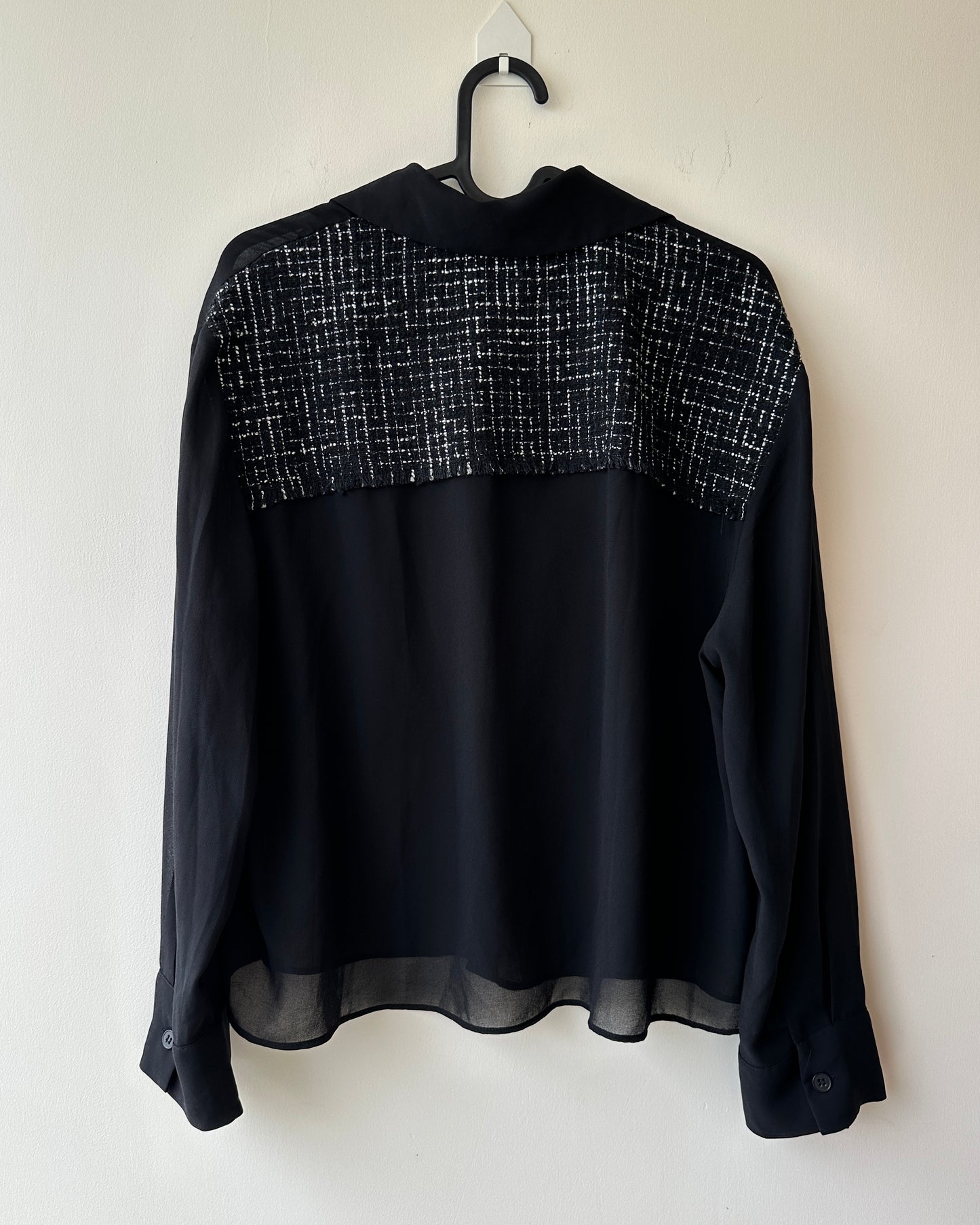 Black sheer top with patch pockets