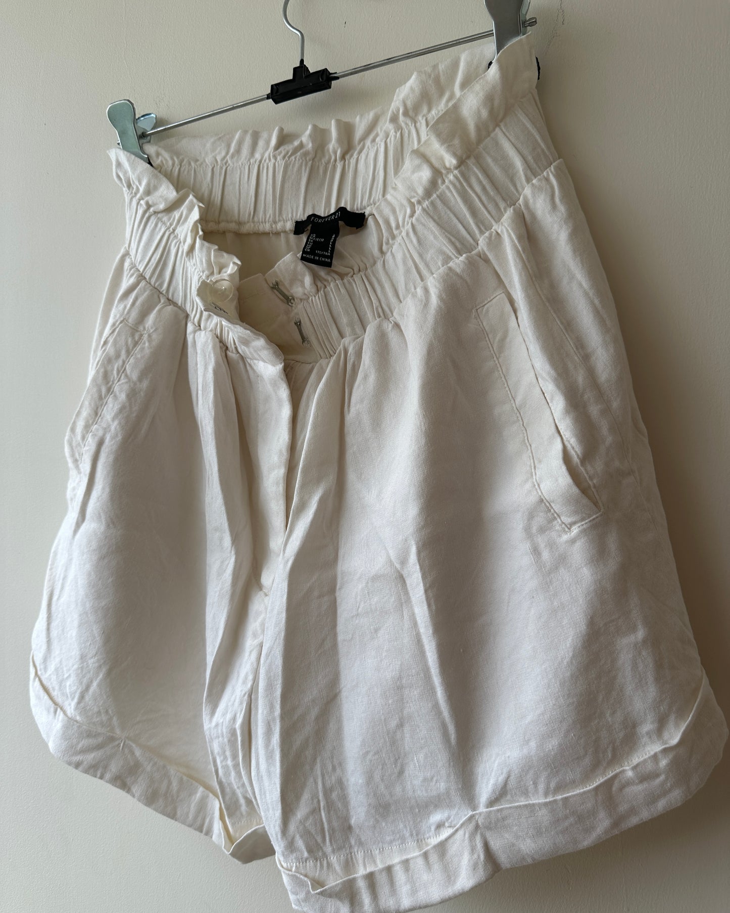 Off-white cotton shorts