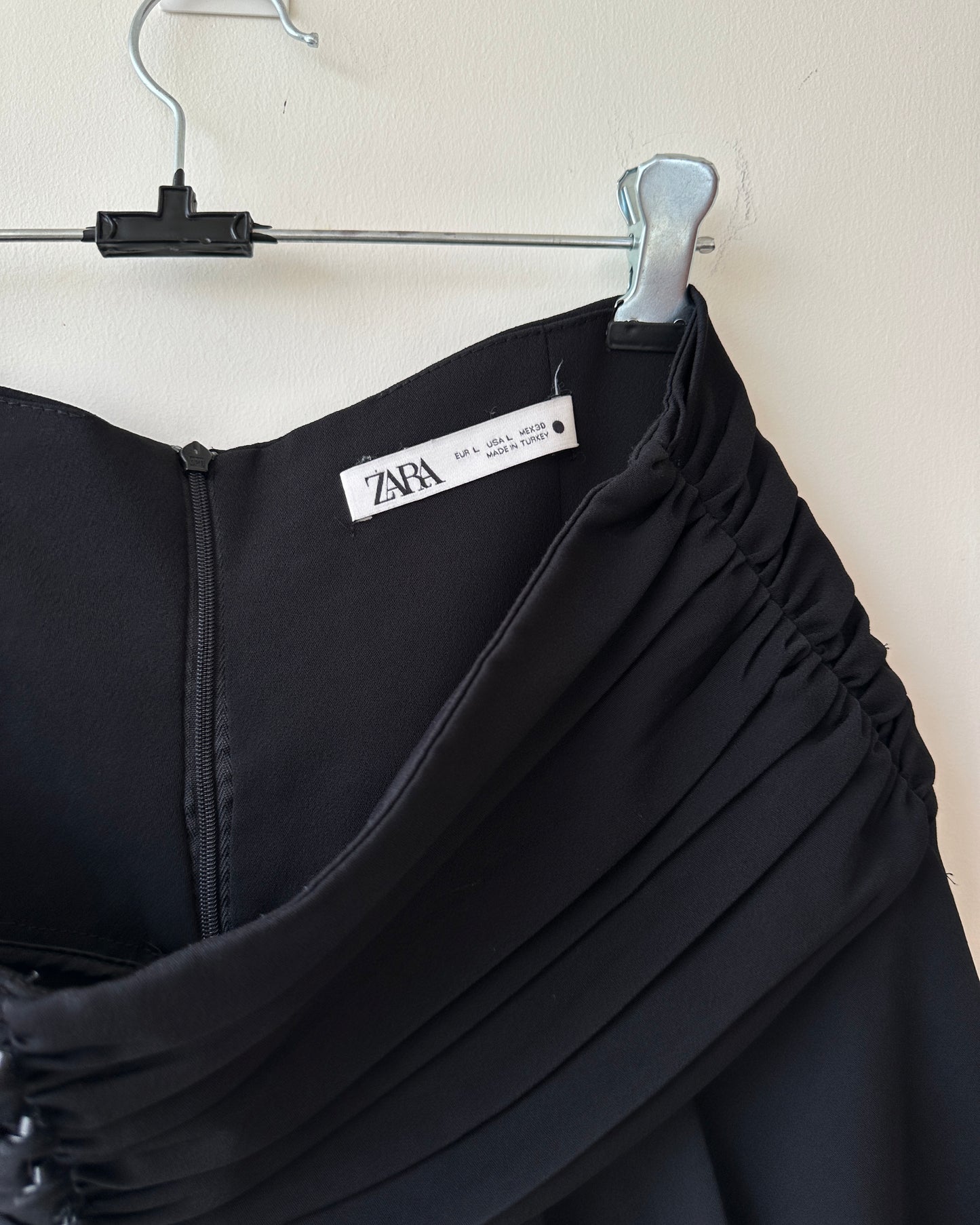 Black pleated high waist shorts with buttons
