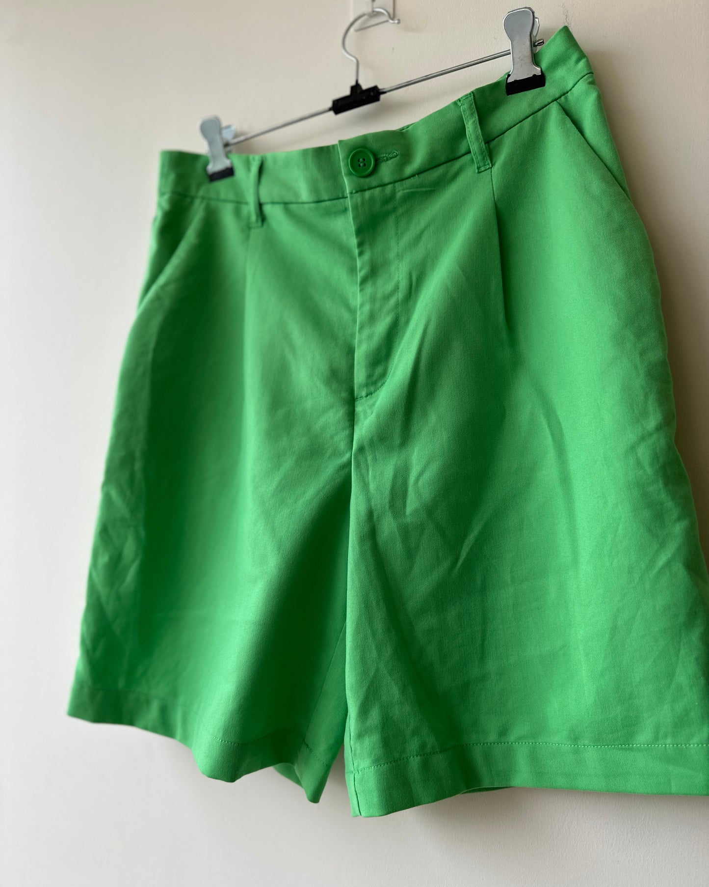 Green bermuda shorts
