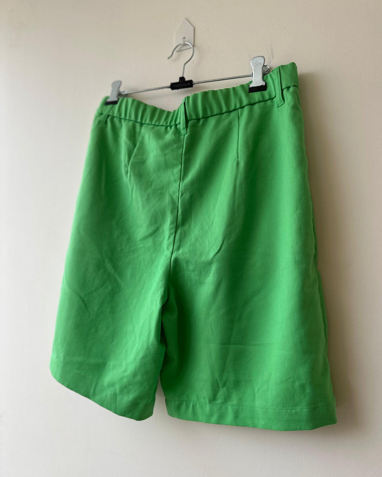 Green bermuda shorts