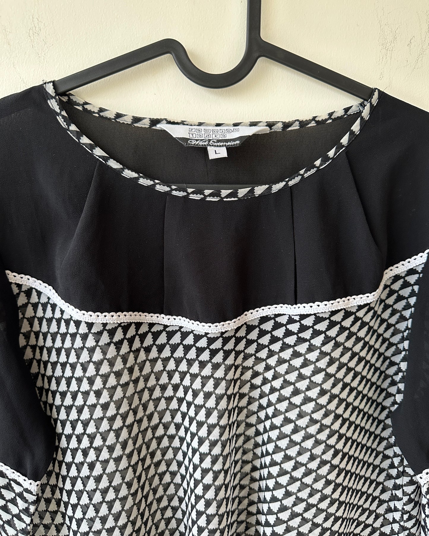 Black and white sheer top with bell sleeves