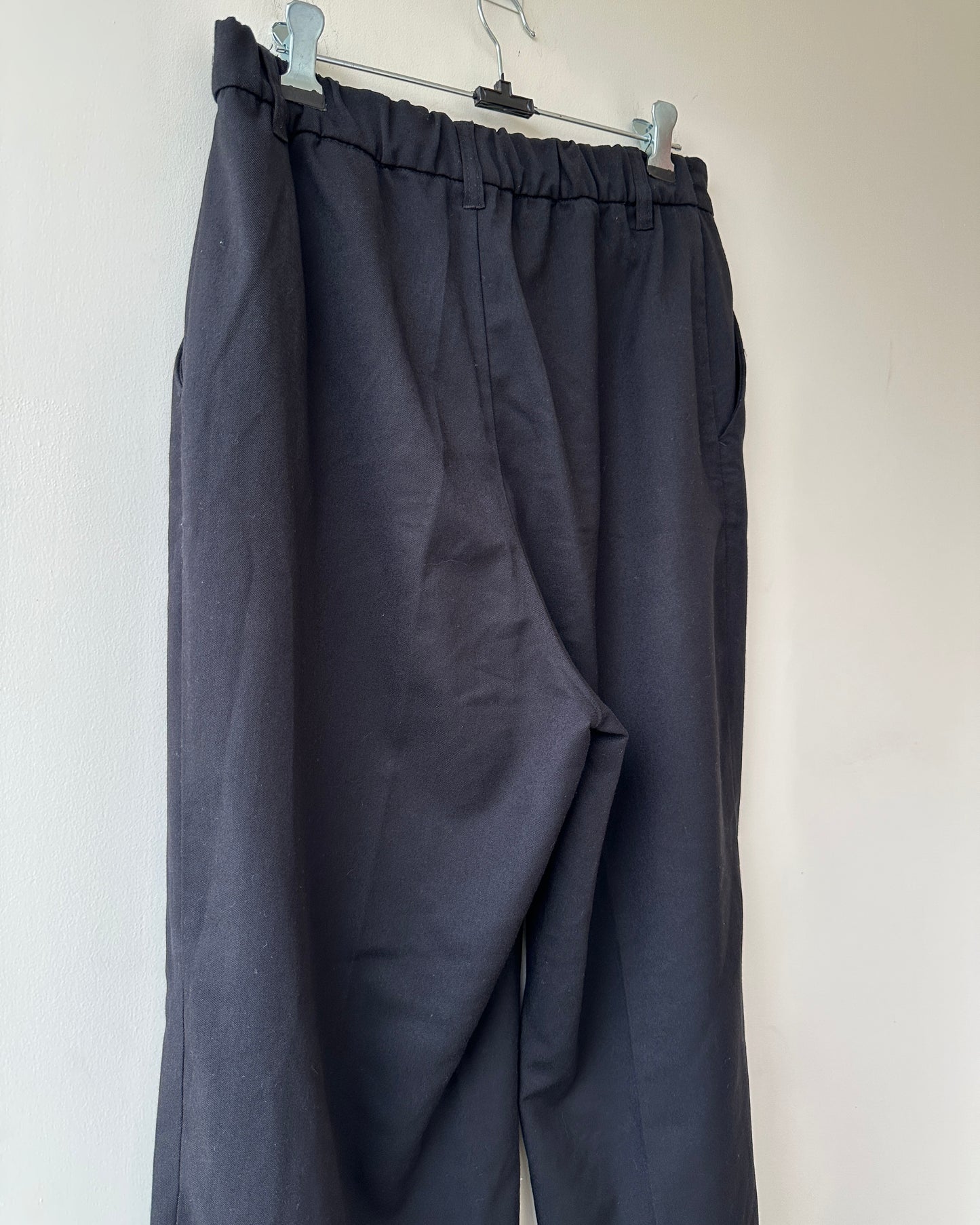 Black full length trousers