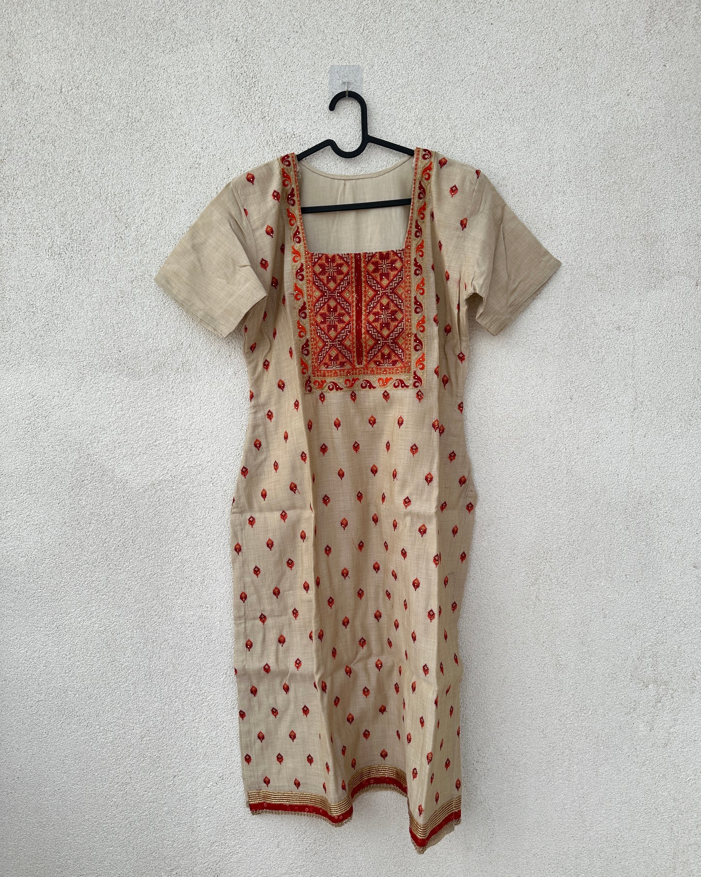 Beige kurta with red embroidery