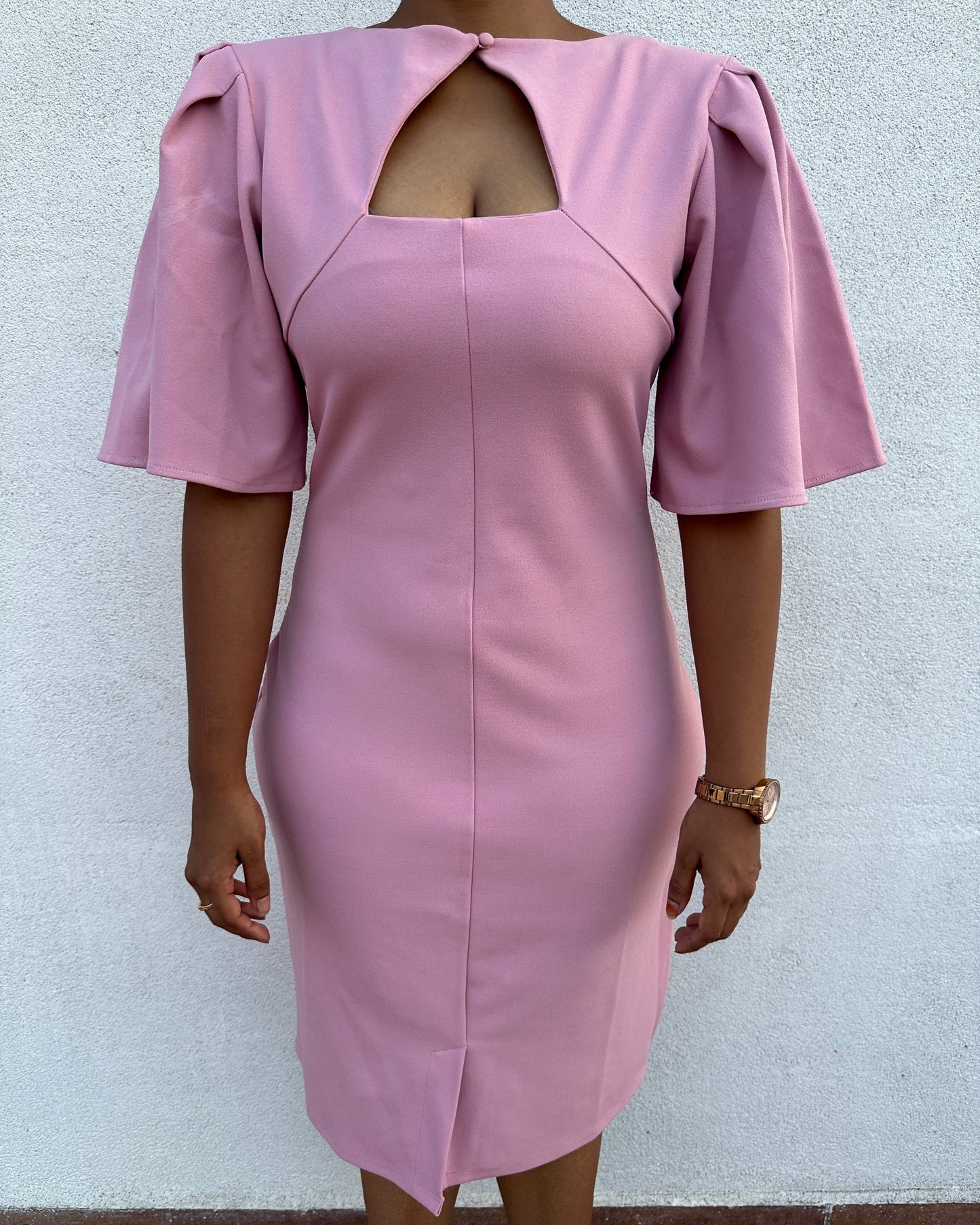 Fitted pink dress with bell sleeves