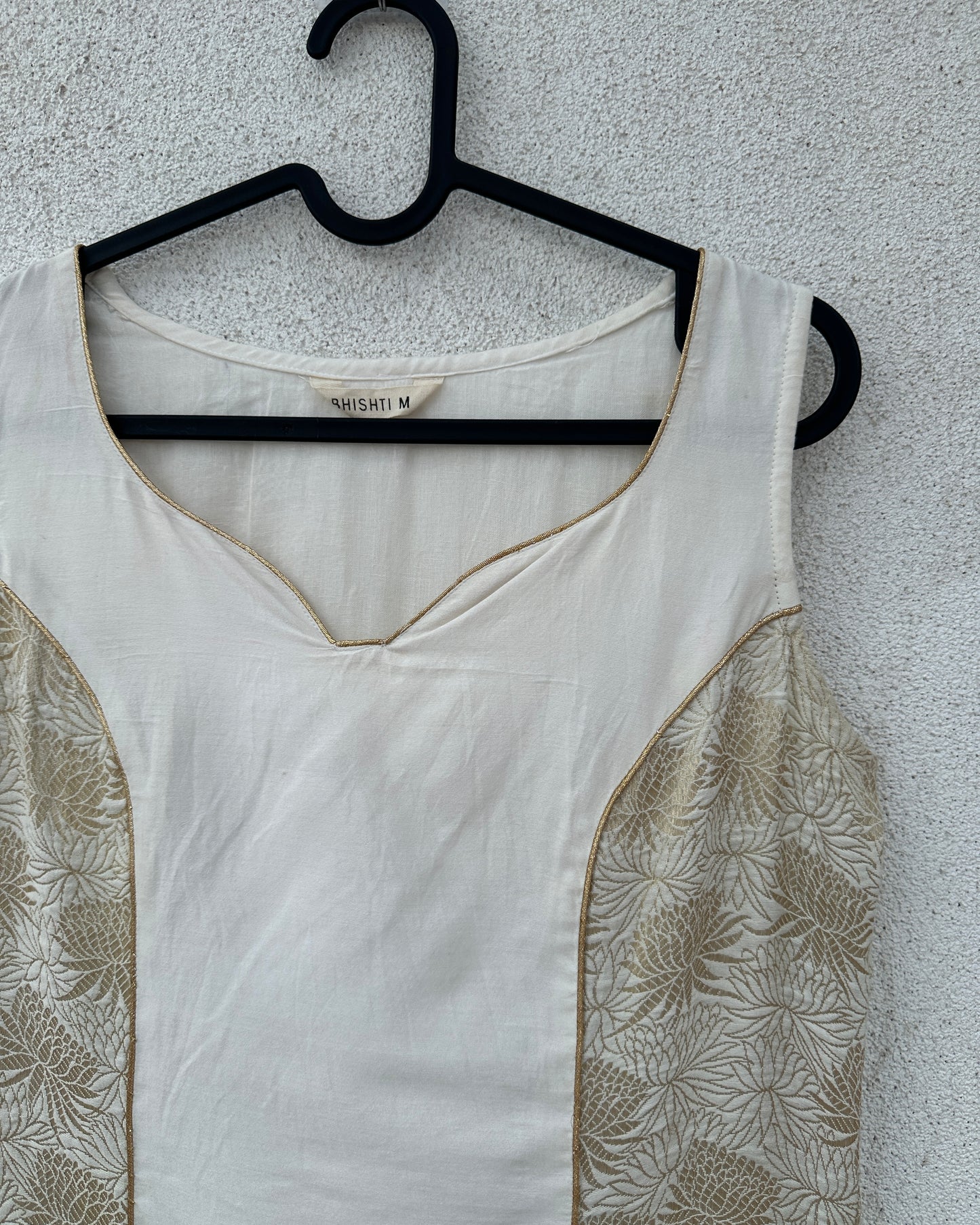 White kurti with gold panelling