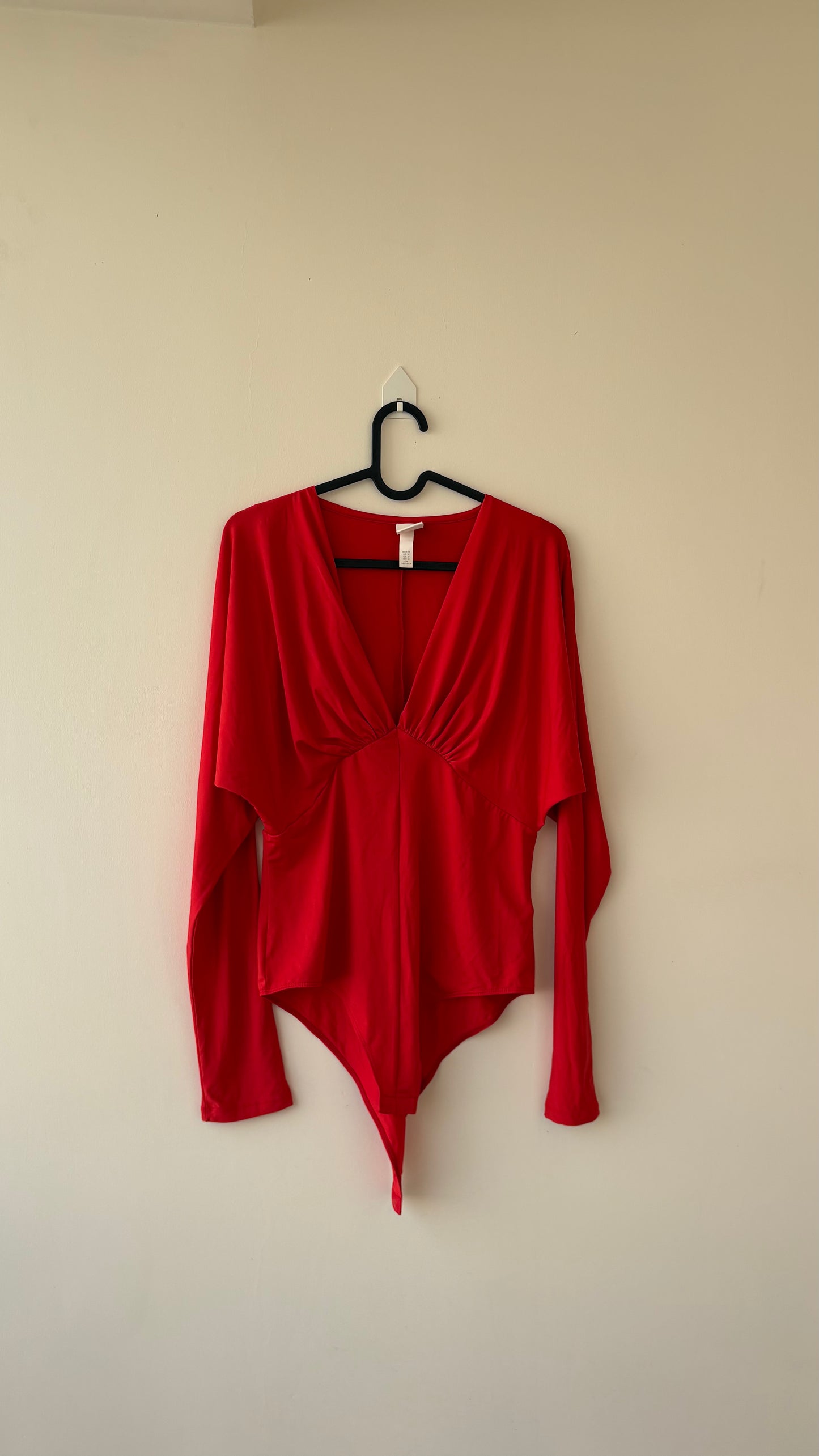 Red V-neck H&M bodysuit top