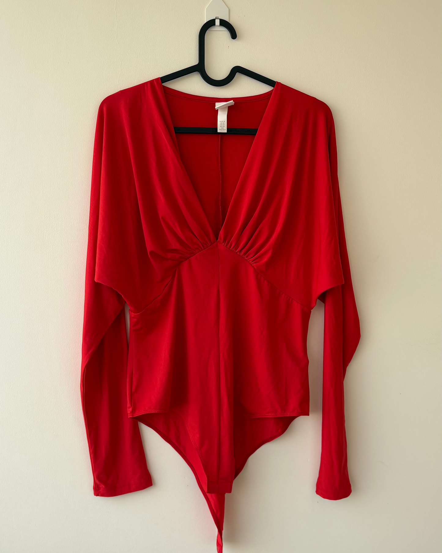 Red V-neck H&M bodysuit top