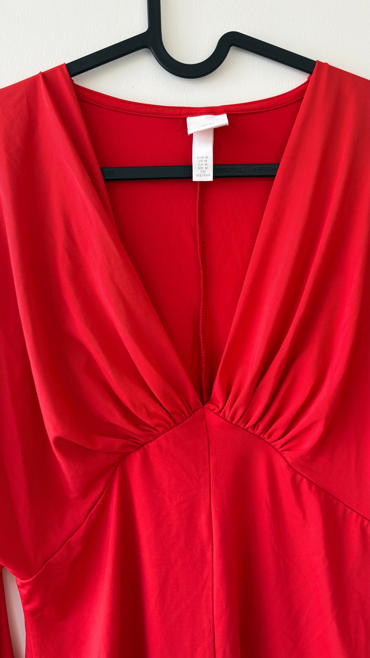 Red V-neck H&M bodysuit top