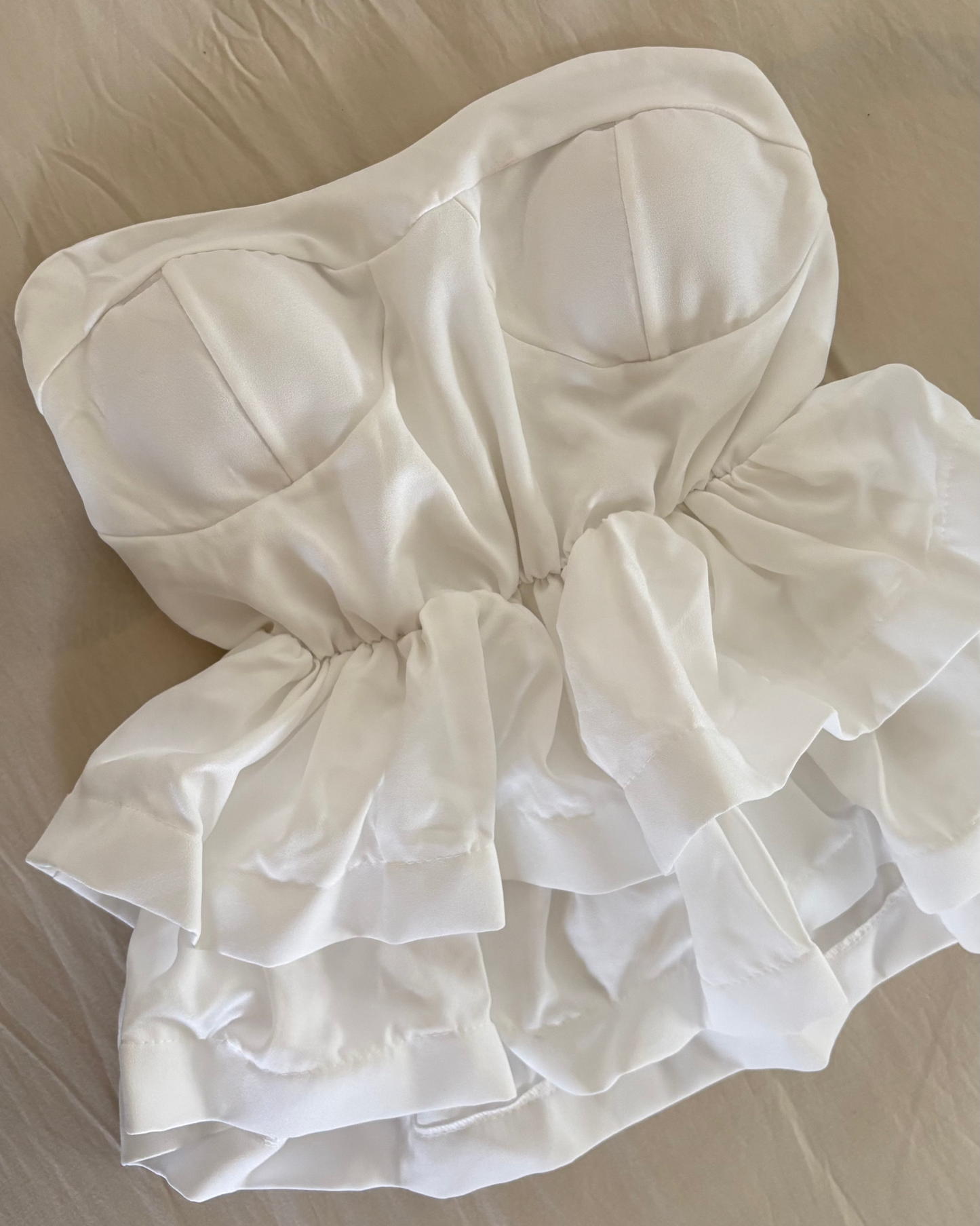 White strapless peplum