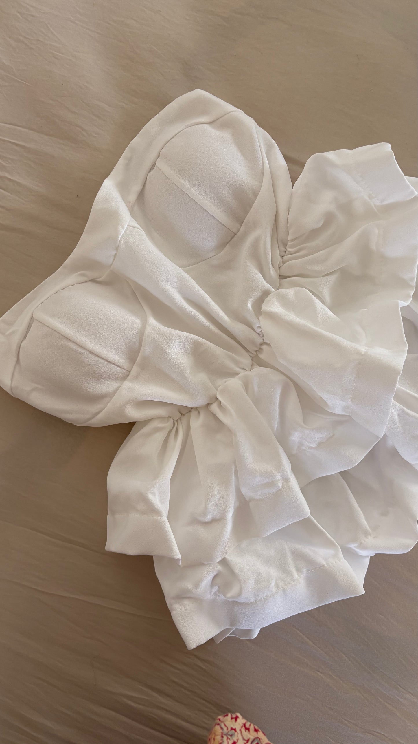 White strapless peplum