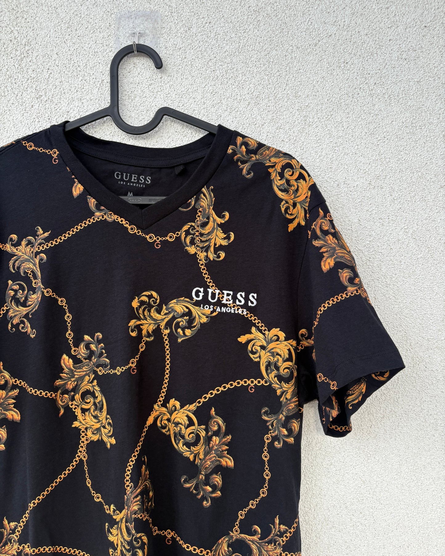 Black with yellow print T shirt