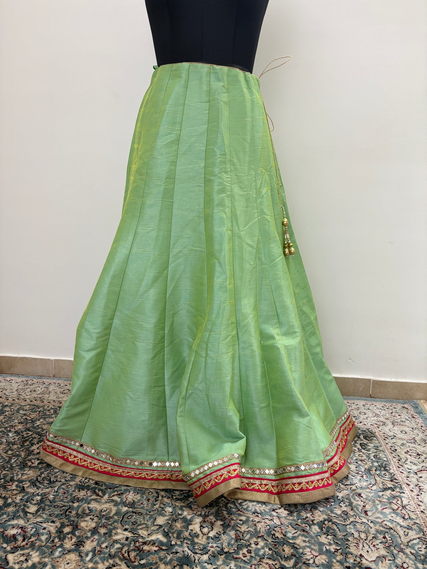Green lehenga with pink border