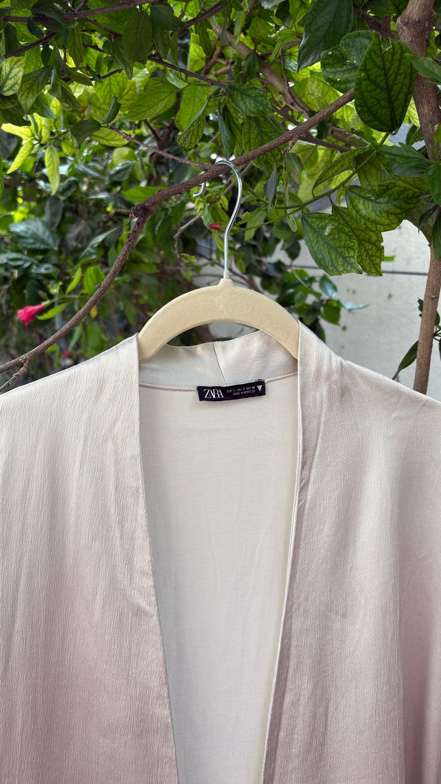 Beige satin pullover style top with tie-ups