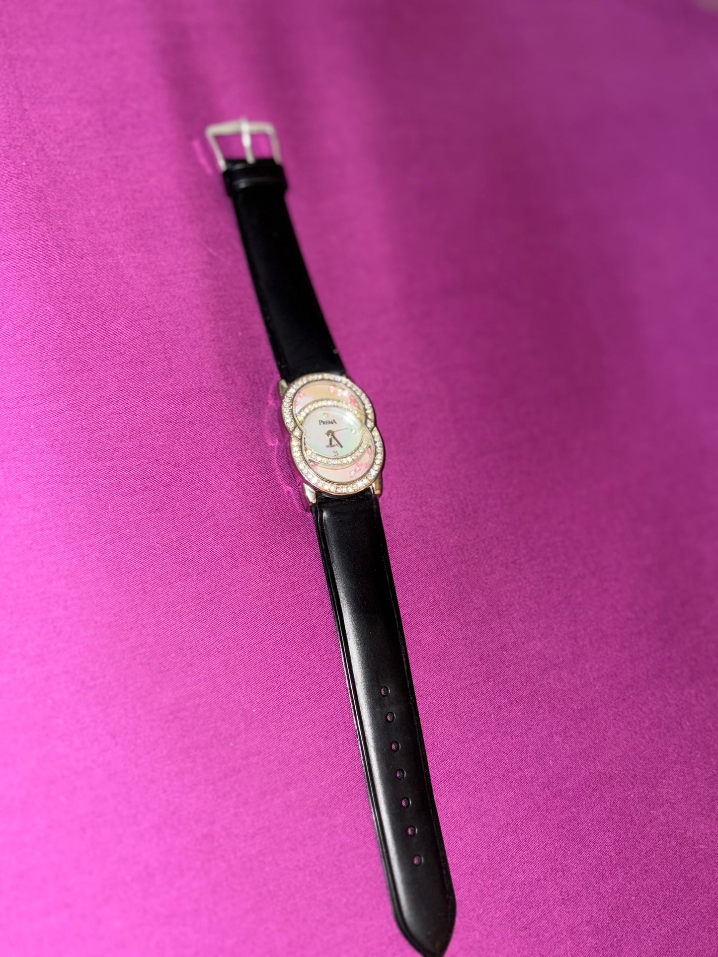 Black leather watch with studded dial