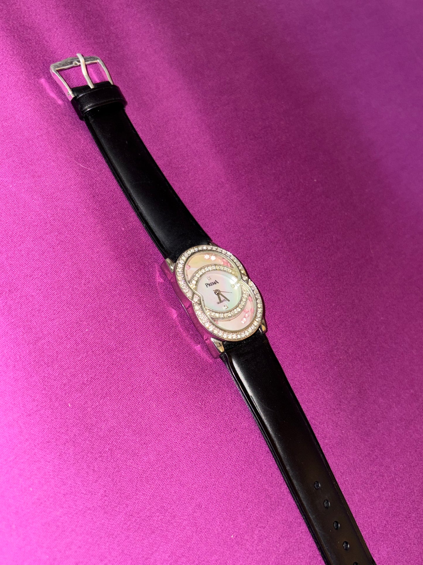 Black leather watch with studded dial
