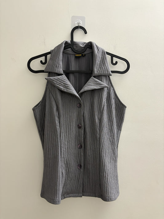 The Circle charcoal grey sleeveless button-down vest top with a structured collar and textured fabric finish.