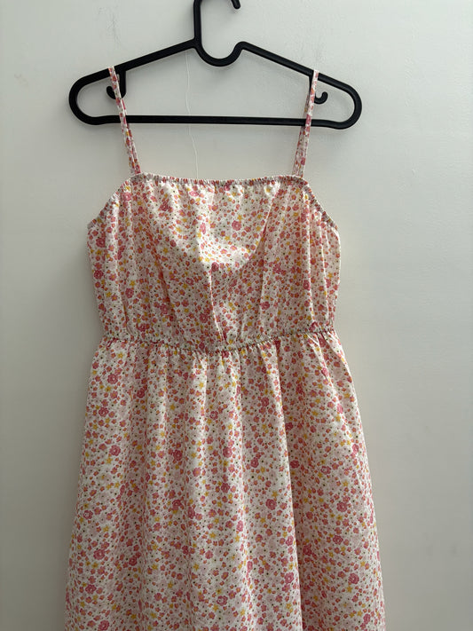 The Circle floral print spaghetti strap maxi dress with a square neckline and elasticated waist in pink and yellow.