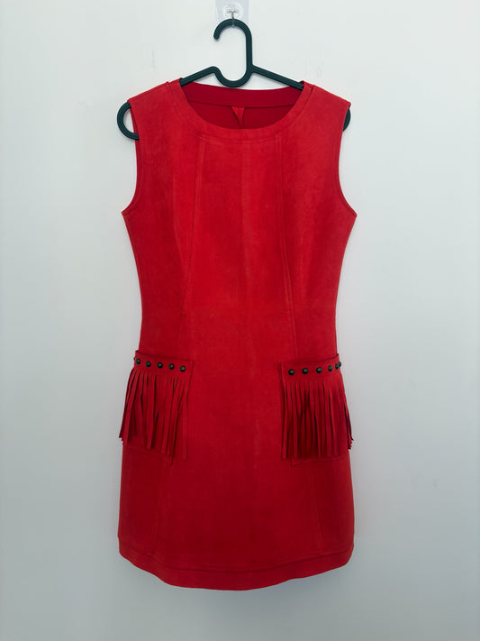 The Circle red sleeveless mini dress in suede-look fabric with fringe-trimmed patch pockets and stud detailing.