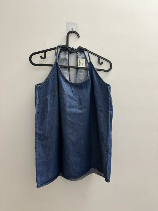 The Circle VERO MODA blue denim halter neck sleeveless top with a relaxed fit and tie-back detail on a hanger
