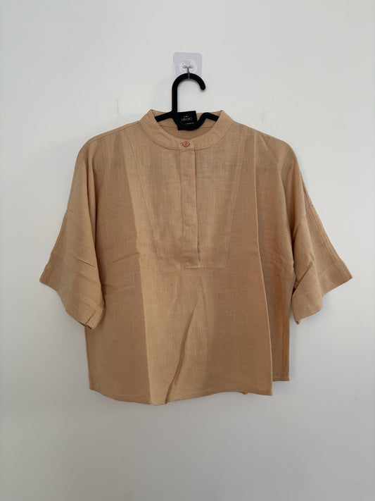 The Circle VIRGIO beige linen-blend boxy top with a mandarin collar and elbow-length sleeves on a hanger.