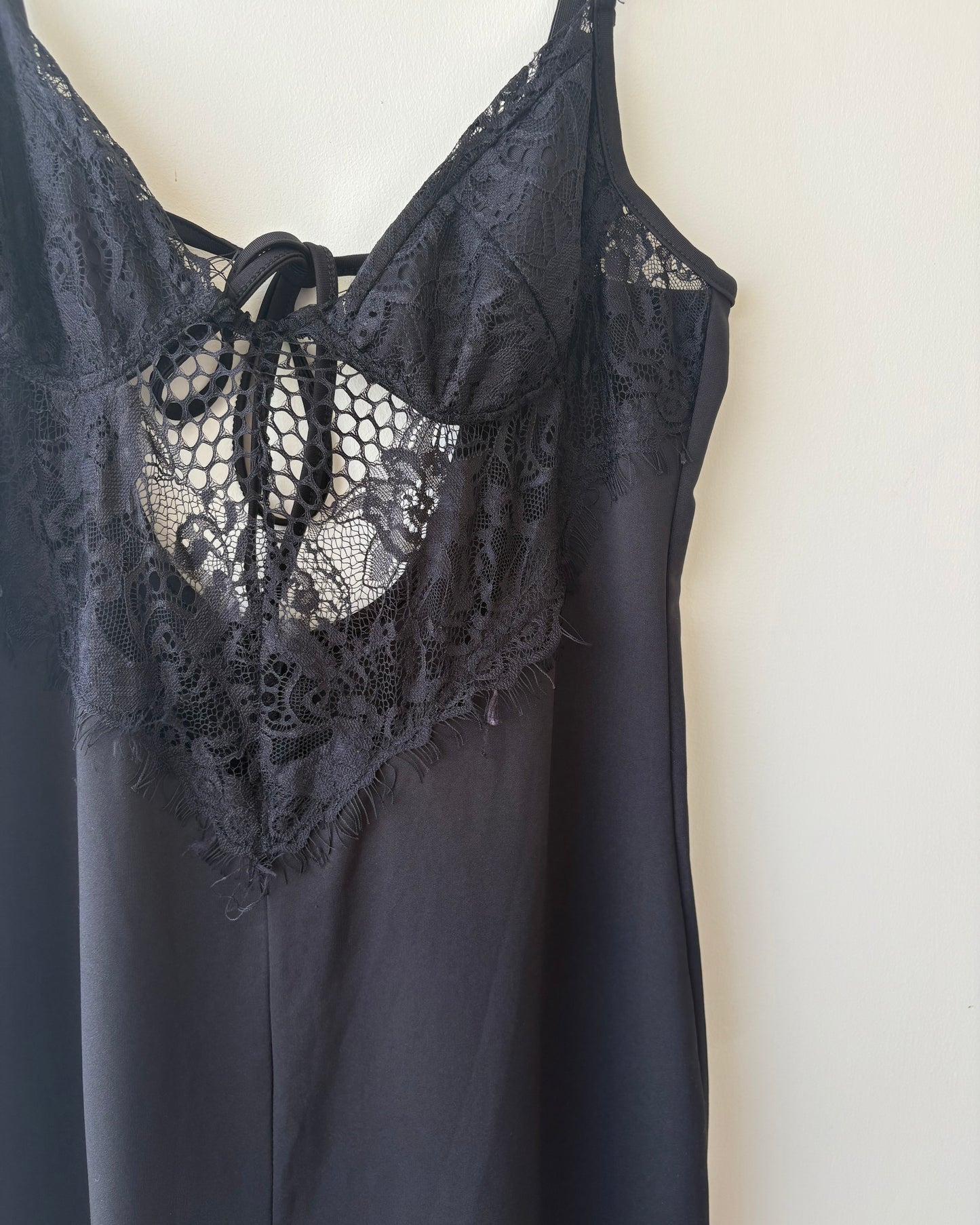 Black jumpsuit with lace bodice and back tie-up