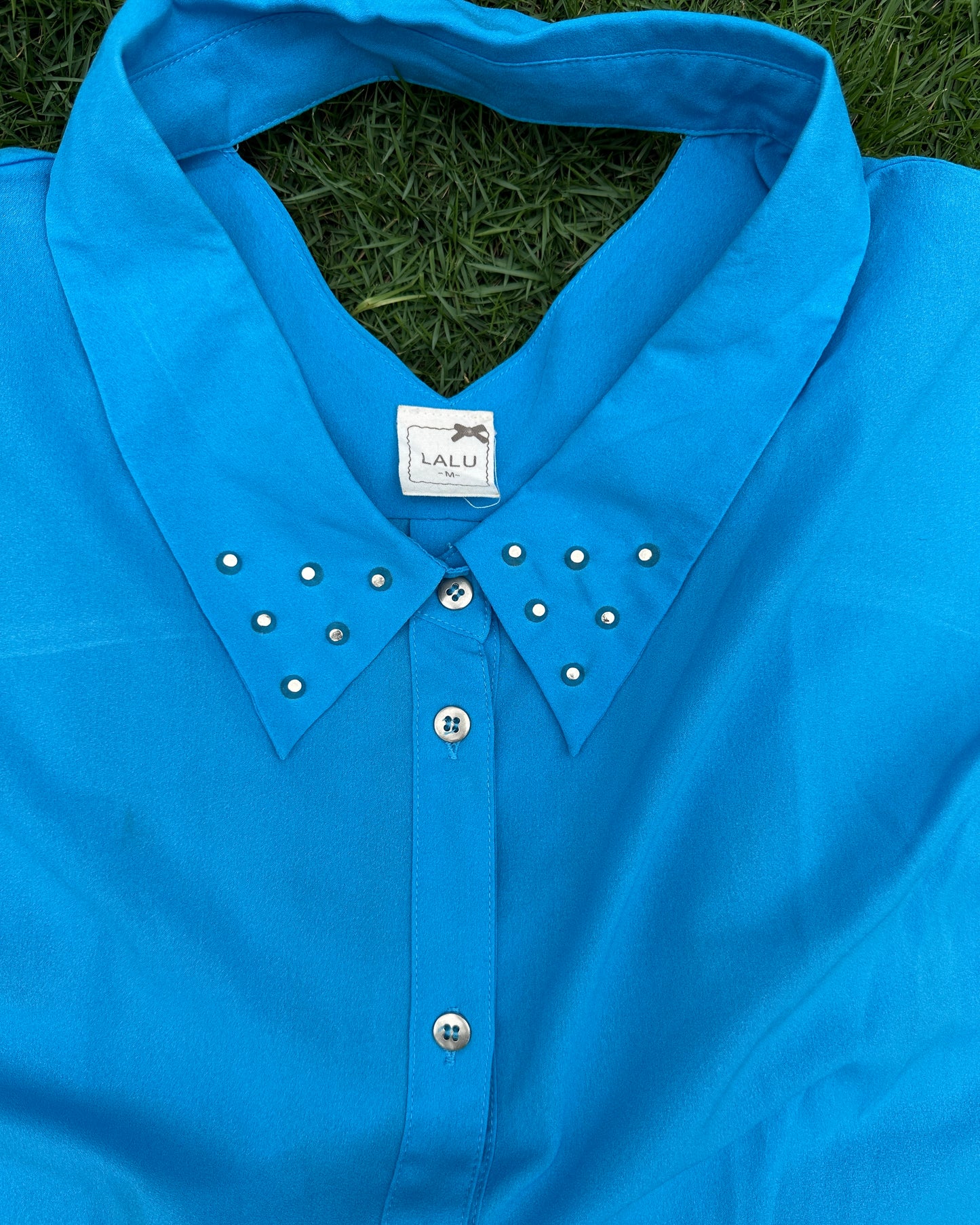 Blue collared top with metal studs