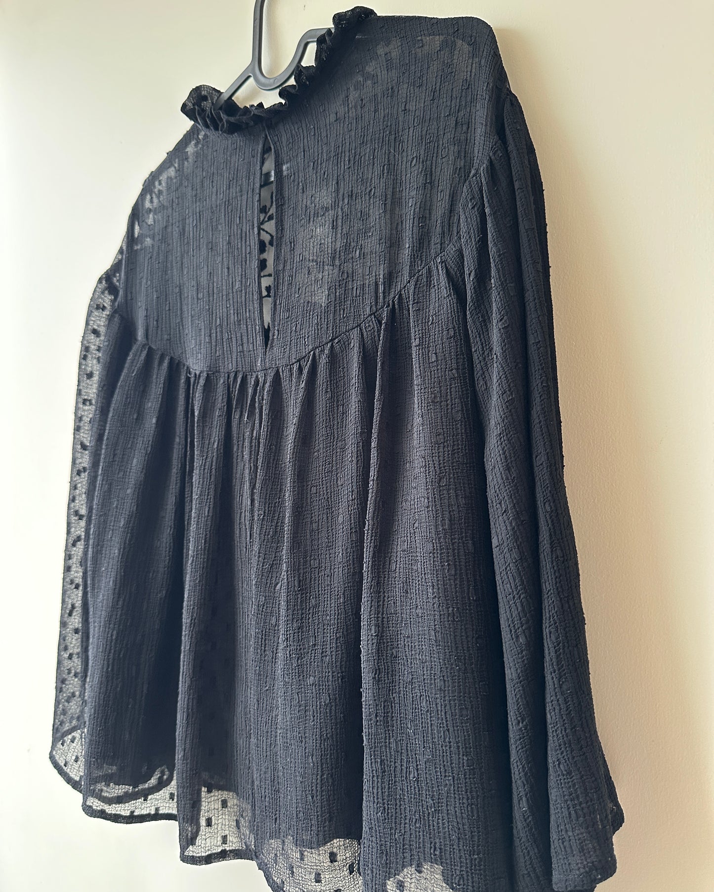Black lace blouse with sheer neck