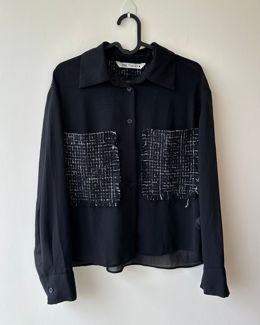 Black sheer top with patch pockets